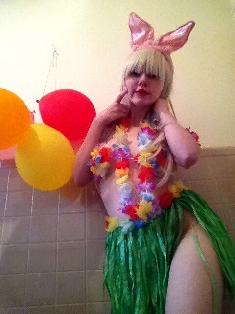 Bunny dressed as a little Hawaiian girl 4 of 4 pics