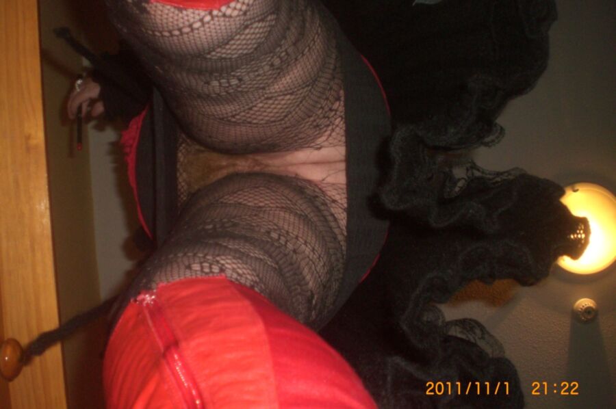 Free porn pics of goldenpussy wearing red blouse and fishnet pantyhose 2 of 10 pics
